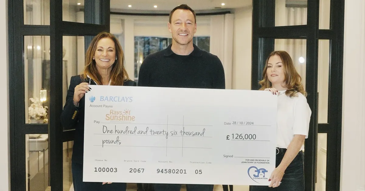 John Terry presenting donation to the Rays of Sunshine charity